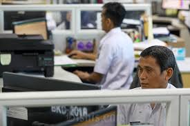 Aktivitas aparatur sipil negara (ASN) di Balai Kota DKI Jakarta. Bisnis