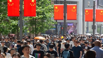 Ilustrasi masyarakat China (Foto: Getty Images/NurPhoto/Ying Tang)